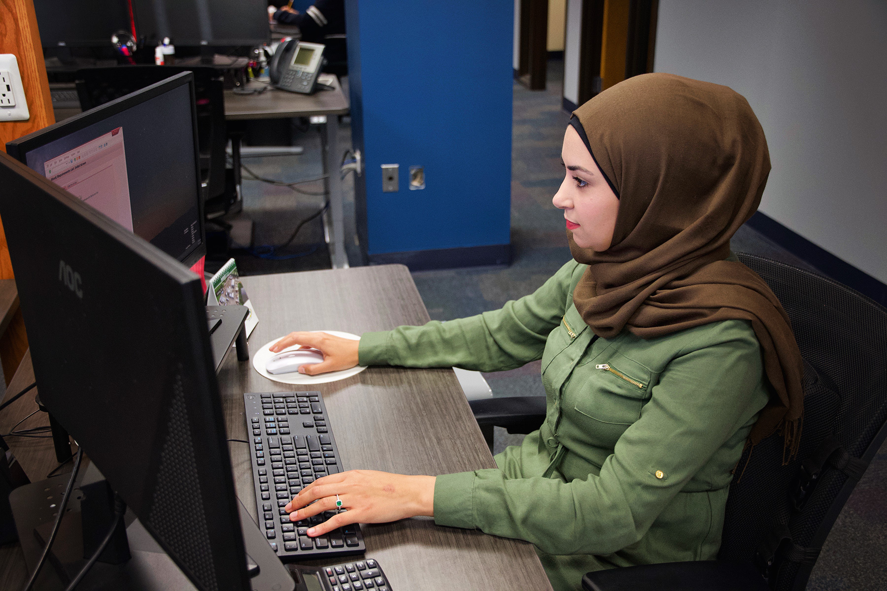 woman working in office on computer